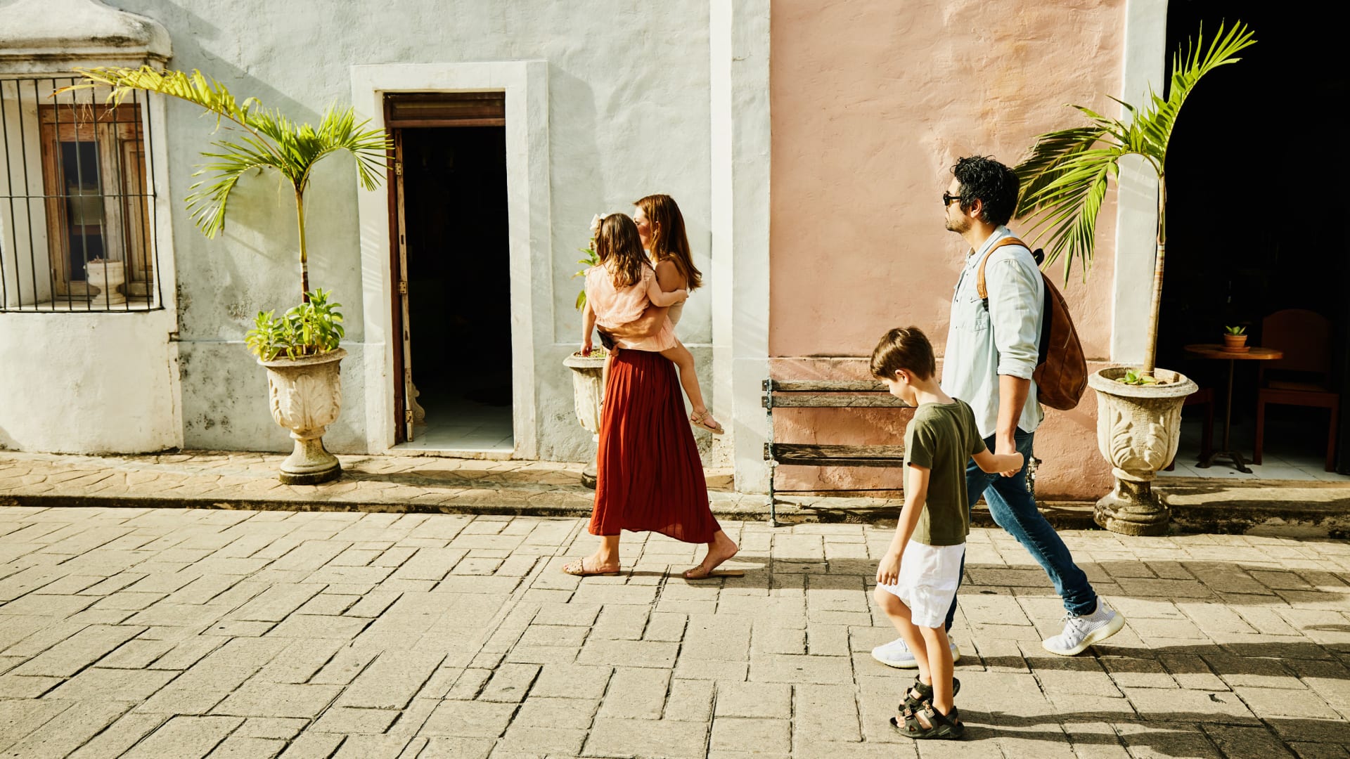 Family walking in the street.