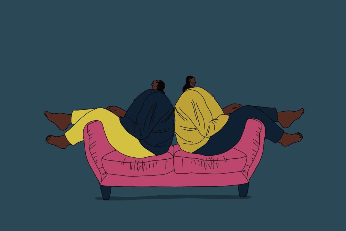 Two people sitting on a coach back to back.