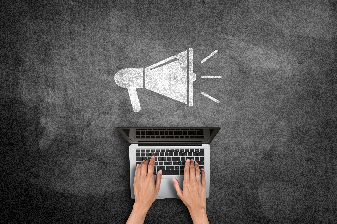 Computer and megaphone: 8 ideas about the future of work in marketing that we learned in 2022.