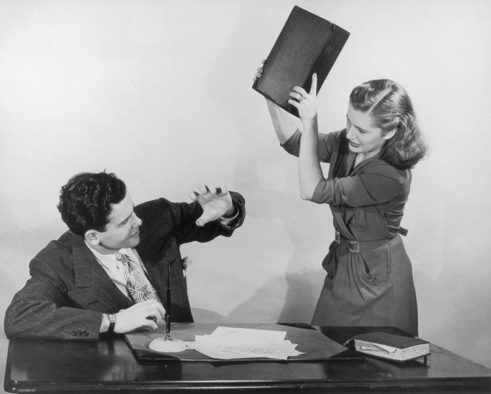 Vintage photo of woman about to slam book on table.