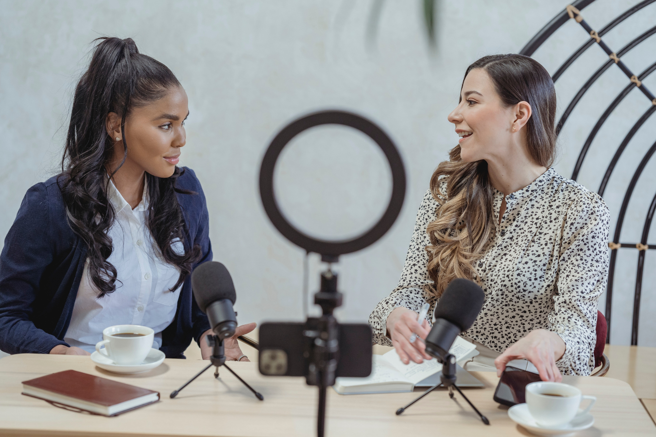 Two marketers talking for a video.